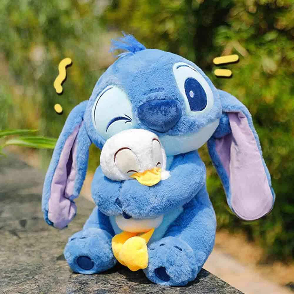 SomniPal™ Stitch Hugging Duck Plush